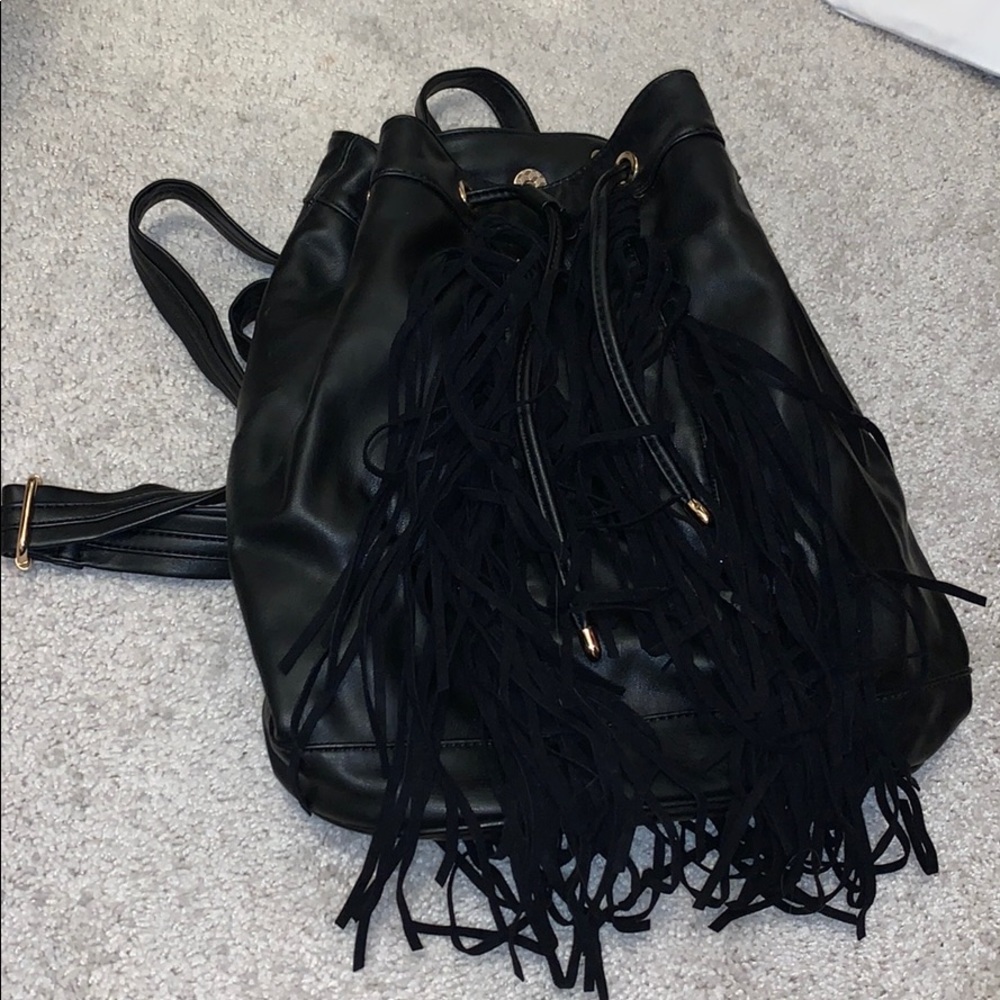 Black backpack with fringe